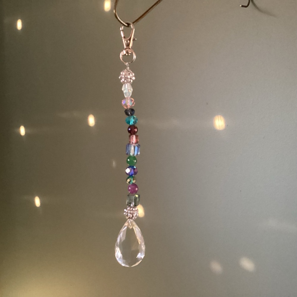 Handcrafted beaded sun catcher with chandelier crystal and lobster claw closure